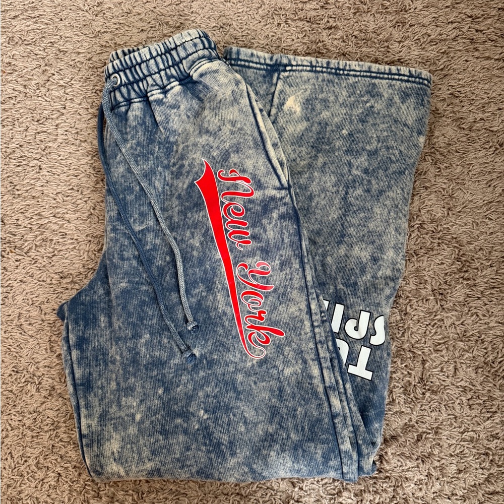 blue acid wash sweatpants with red and white accents #skater